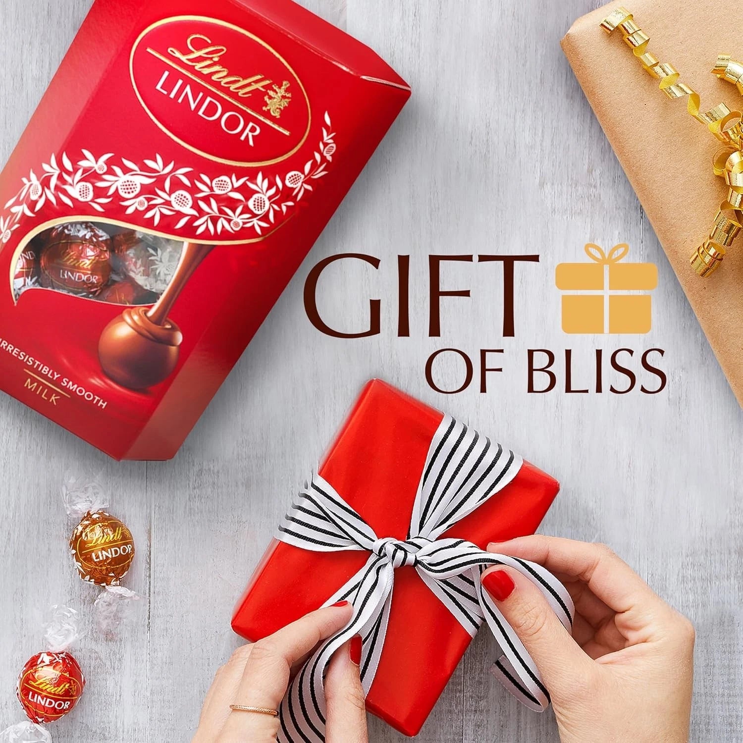 Lindt Lindor Milk Chocolate Truffles – 200g Box (Approx. 16 Balls) – Smooth Fill - Ecotrade Goods Limited